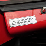 "PLEASE DO NOT SLAM DOOR" warning label / sticker